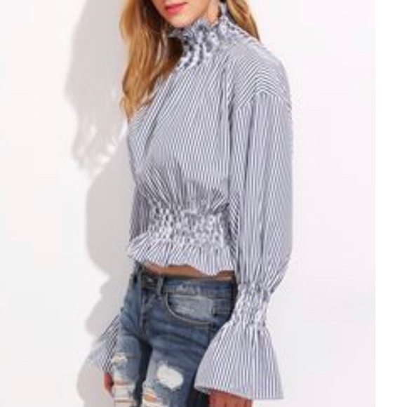 smocked turtleneck blouse